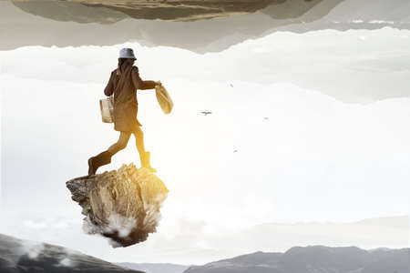 Housewife with shopping bags . Mixed mediaの写真素材