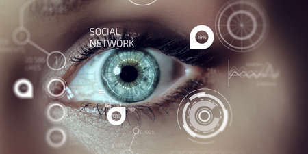 Close up of woman eye in process of scanningの写真素材