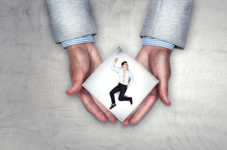 Businessman inside a box . Mixed media