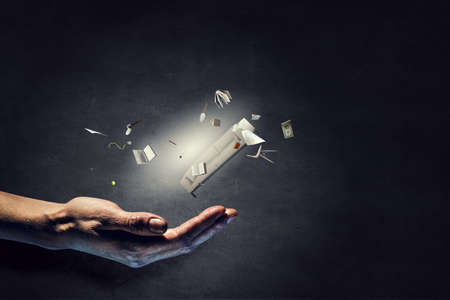 Image of flying books . Mixed media