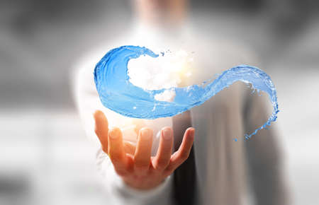 Hands with water splash . Mixed mediaの写真素材