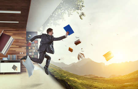 Happy businessman jumping high . Mixed media
