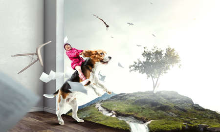 Girl riding a dog . Mixed mediaの写真素材