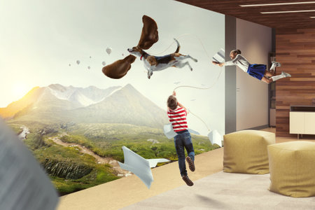 Boy with a dog flying through the air with his earsの写真素材