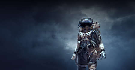 Astronaut walking on an unexplored planetの写真素材