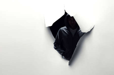 Silhouette of man in hoody