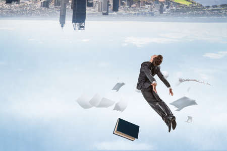 Business man flying up  mixed mediaの写真素材