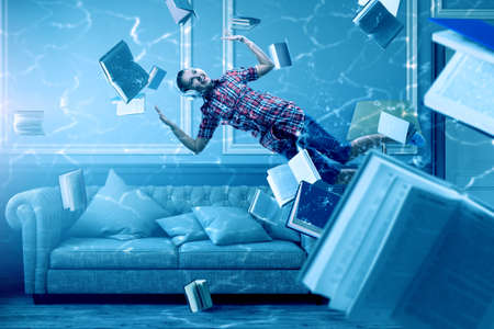 Woman wearing headphones underwater . Mixed mediaの写真素材