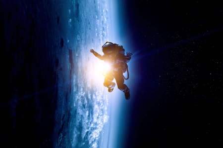 Astronaut at spacewalk . Mixed mediaの写真素材