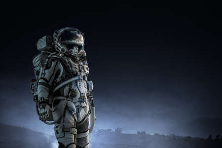 Astronaut walking on an unexplored planetの写真素材