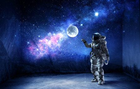 Astronaut at spacewalk . Mixed mediaの写真素材