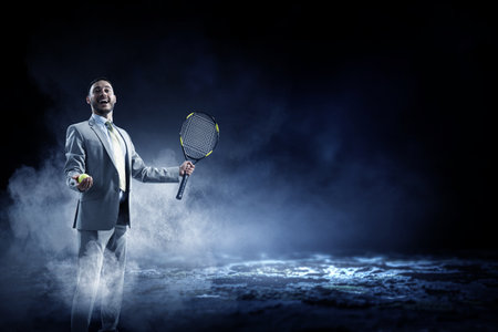 Businessman playing tennis . Mixed mediaの写真素材