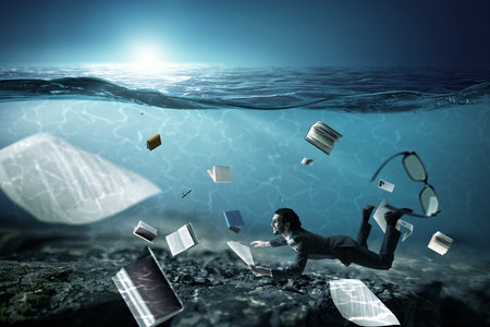 Business man with paper and pen underwaterの写真素材