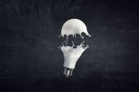 Light bulb with white glass splash