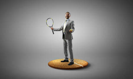 The one caucasian man playing tennisの写真素材