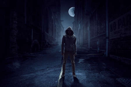 Silhouette of man in hoody