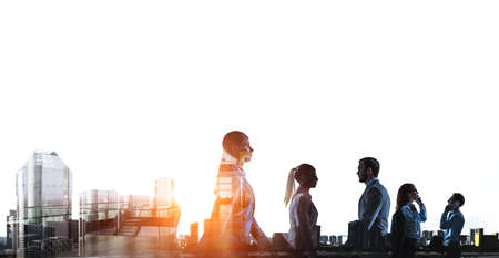 Group of business people outlines with lit background