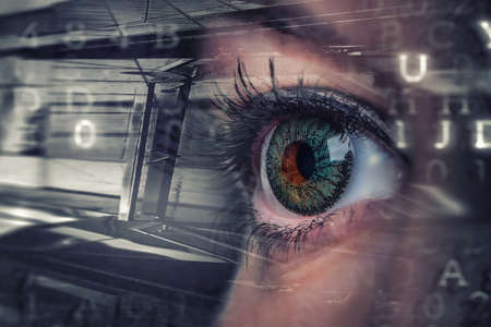 Close up of woman eye in process of scanningの写真素材