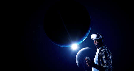 Space and man wearing virtual reality goggles