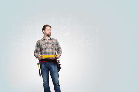 Male builder in the helmet