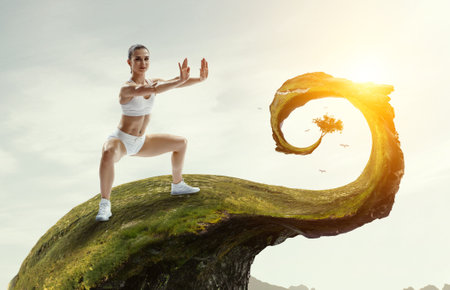 Young beautiful girl wearing fashion sports wear doing exerciseの写真素材