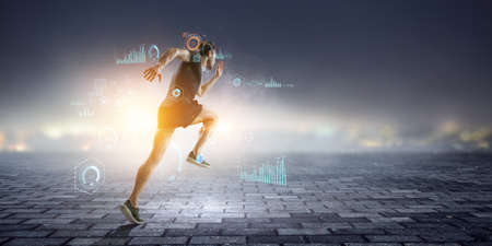 Man in sportwear running . Mixed mediaの写真素材