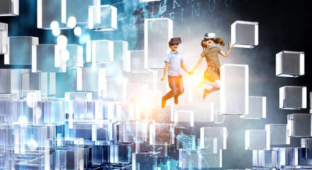 Kids wearing virtual reality gogglesの写真素材