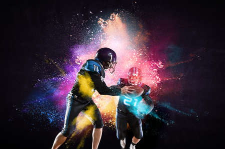 Businessman acting as american football playersの写真素材