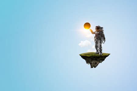 Spaceman on a light bulb