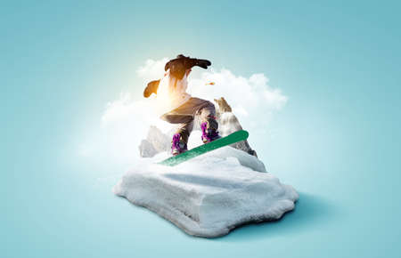 Snowboarder and Alps landscapeの写真素材