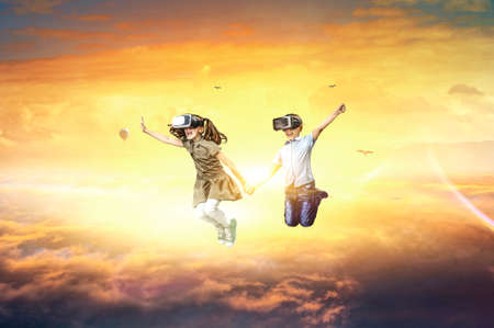 Kids wearing virtual reality gogglesの写真素材