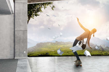 Young woman riding her skateboardの写真素材