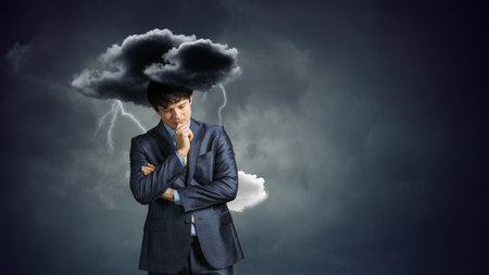 Stressed businessman concept . Mixed mediaの写真素材