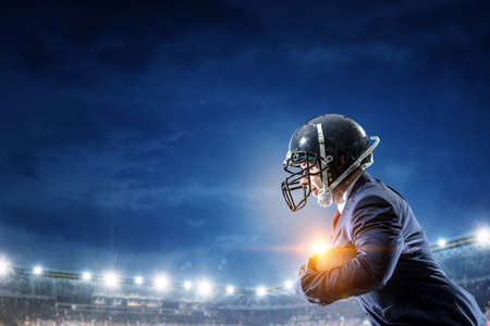 Businessman acting as american football players