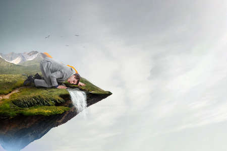 Listening businessman on the floorの写真素材