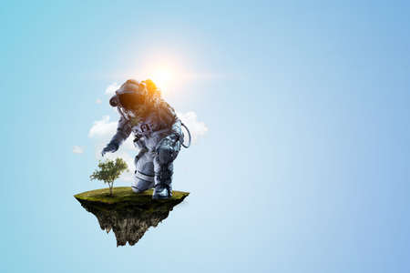 Spaceman on a light bulbの写真素材