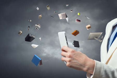 Conceptual image with business items flying in air
