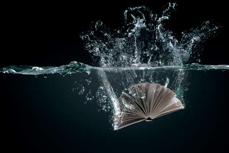 Book in water . Mixed media