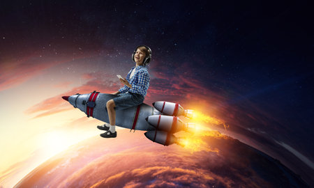 Kid wearing headphones on a rocket