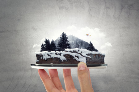 Mountain with snow top in handsの写真素材