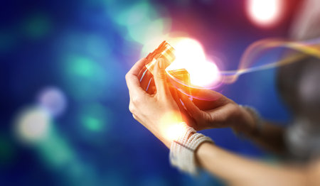 Closeup hands giving surprise gift boxの写真素材