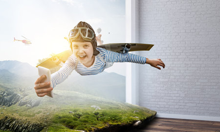 World of books concept with flying boyの写真素材