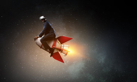 Businessman on a rocket . Mixed media
