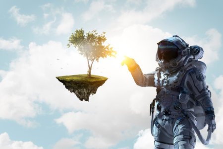 Astronaut against cloudy sky background. Mixed media