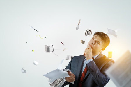 Thoughtful successful businessman dreaming. Mixed mediaの写真素材