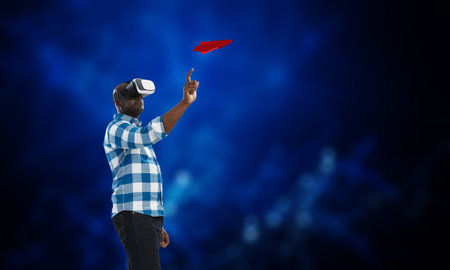 Man wearing virtual reality gogglesの写真素材