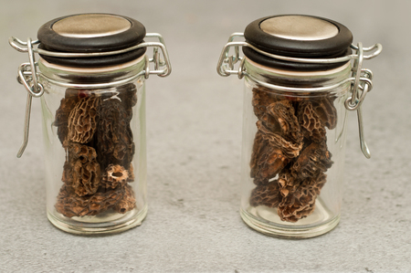 group of morels dried on glass jars