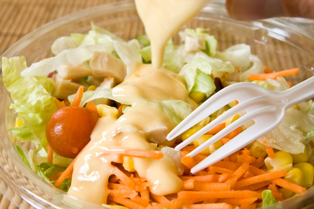 Closeup of take away bowl with fast food saladの写真素材