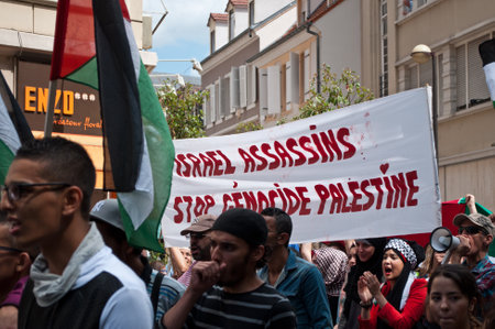 Mulhouse - France - 2 august 2014 - demonstration for peace between Israel and Palestine, against the Israeli bombing in Gazaのeditorial素材