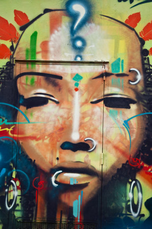 urban art  street in Paris- woman face with piercingのeditorial素材